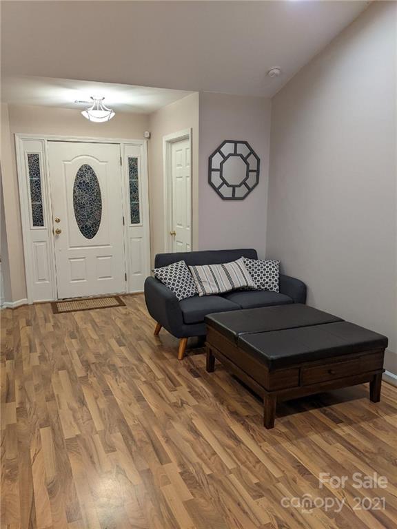 5030 Gibbons Link Road Charlotte, NC 28269 - Photo 2 of 28 a spacious bedroom with a bed and a closet