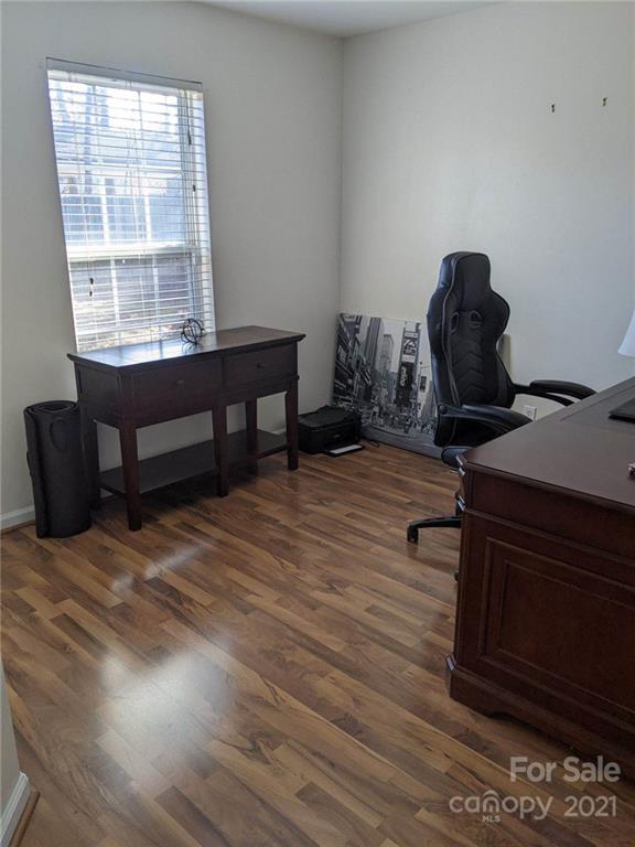 5030 Gibbons Link Road Charlotte, NC 28269 - Photo 14 of 28 a view of a workspace with furniture and a window