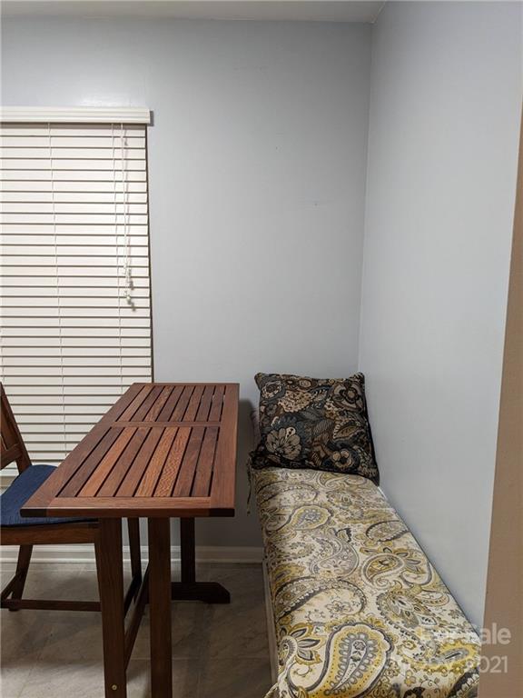 5030 Gibbons Link Road Charlotte, NC 28269 - Photo 19 of 28 a bedroom with a bed and a window