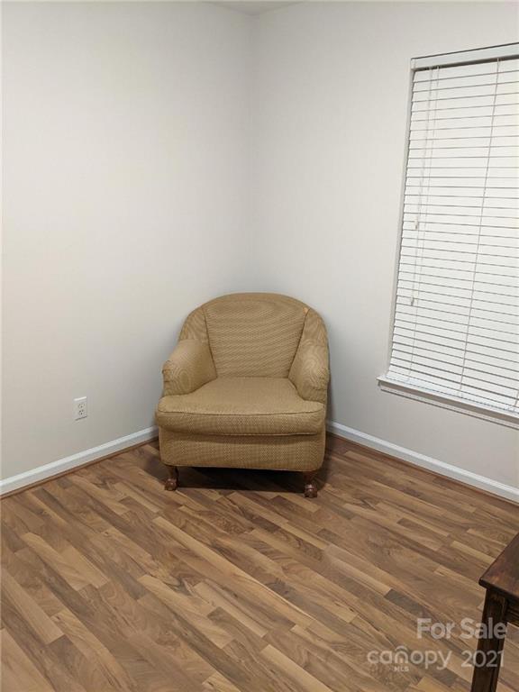 5030 Gibbons Link Road Charlotte, NC 28269 - Photo 20 of 28 a small living room with a couch and a window