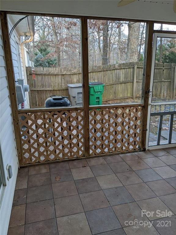 5030 Gibbons Link Road Charlotte, NC 28269 - Photo 21 of 28 a view of wooden floor with a large window