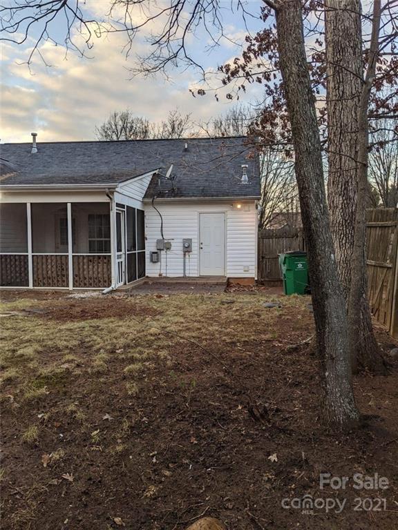 5030 Gibbons Link Road Charlotte, NC 28269 - Photo 25 of 28 a front view of a house with a garden