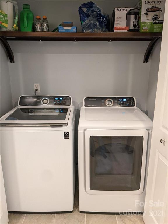 5030 Gibbons Link Road Charlotte, NC 28269 - Photo 7 of 28 a close up view of washer and dryer