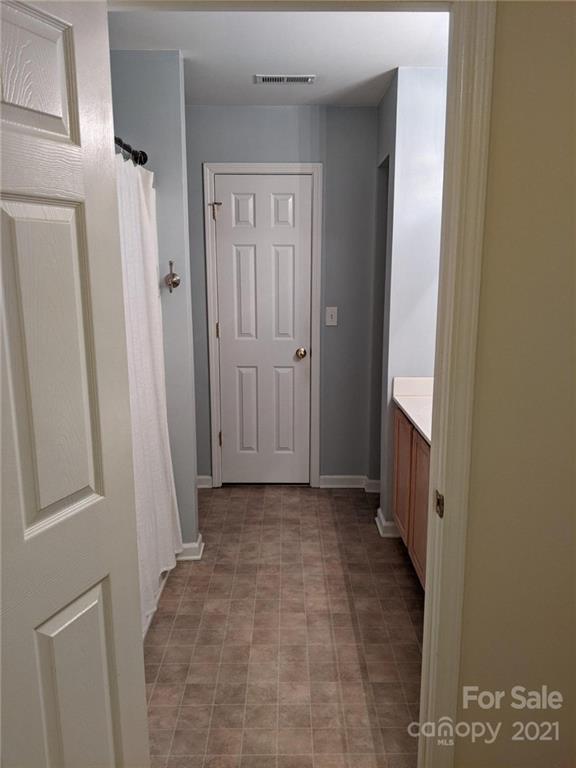 5030 Gibbons Link Road Charlotte, NC 28269 - Photo 10 of 28 a view of a hallway with a door