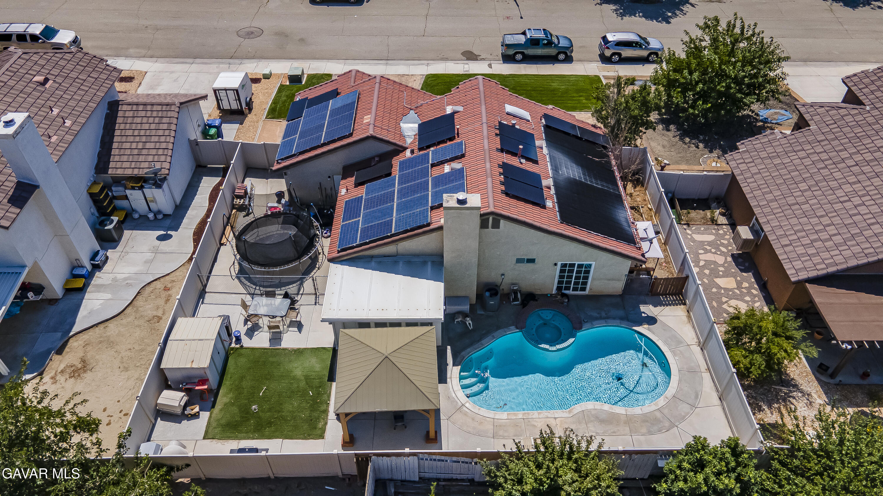 5767 East Ave R 11 Palmdale, CA 93552 - Photo 4 of 27 an aerial view of residential house with outdoor space and parking