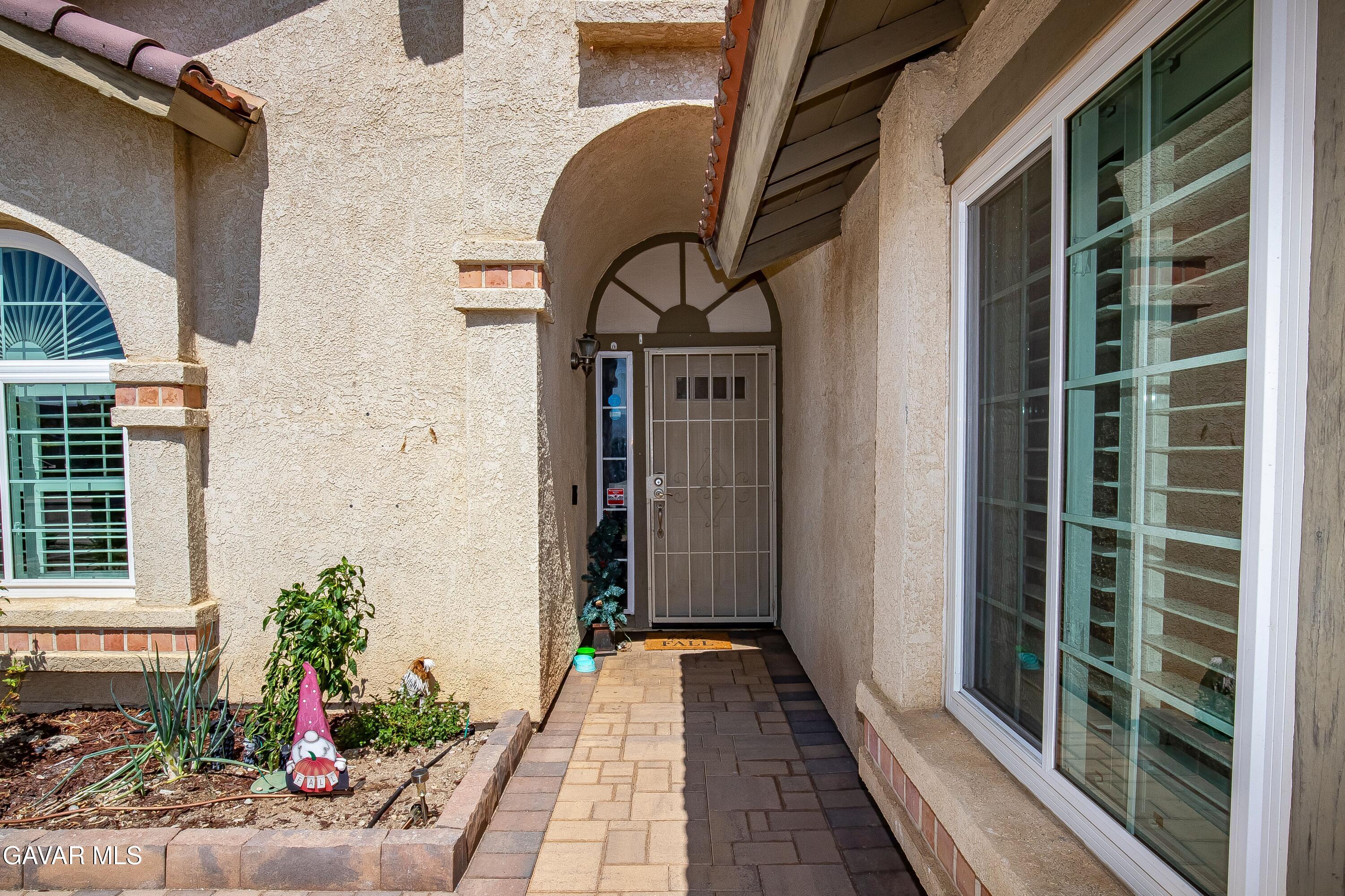 5767 East Ave R 11 Palmdale, CA 93552 - Photo 5 of 27 a house view with a outdoor space