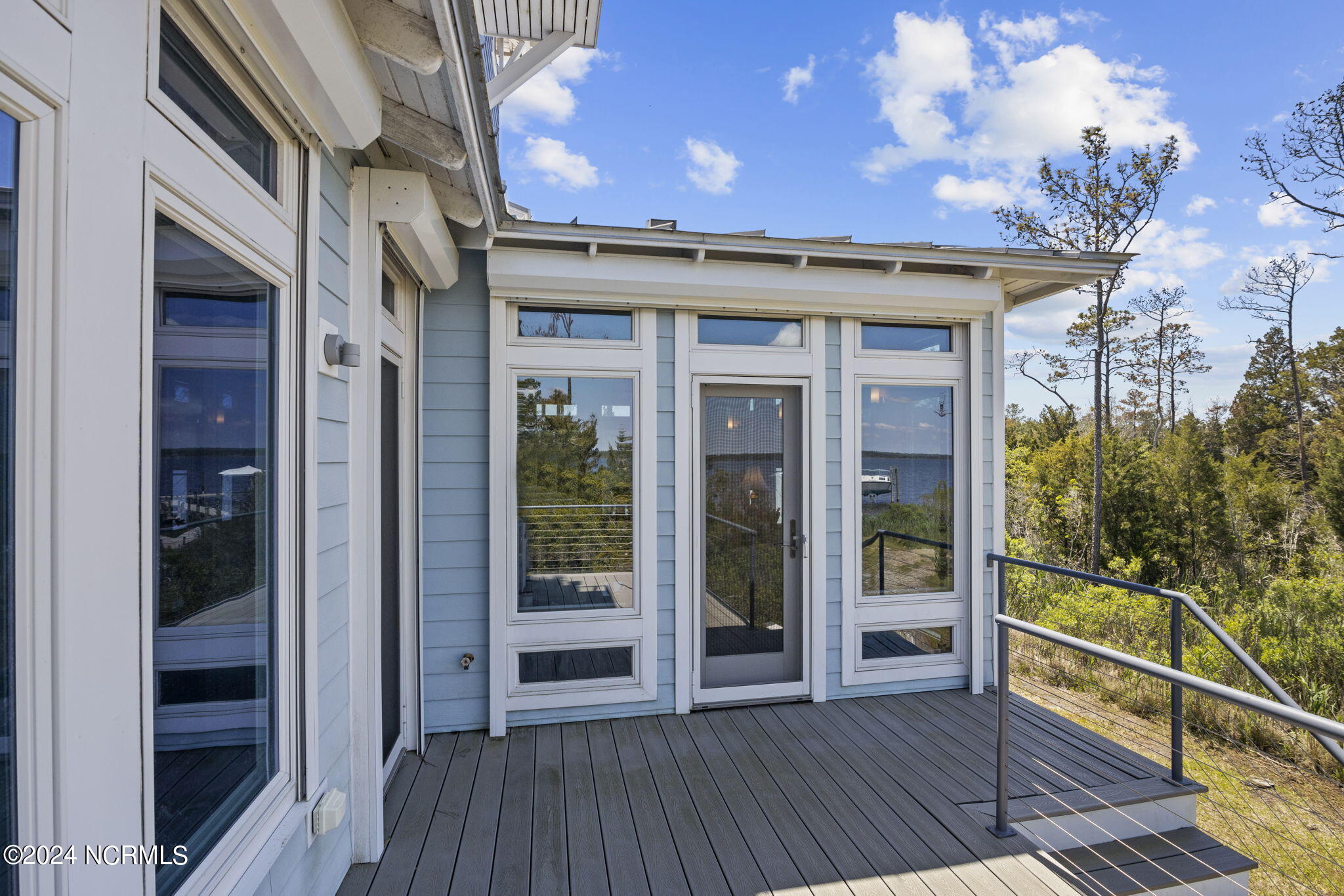 1411 Pasture Point Road Merritt, NC 28556 - Photo 20 of 96 Deck off Dining Room