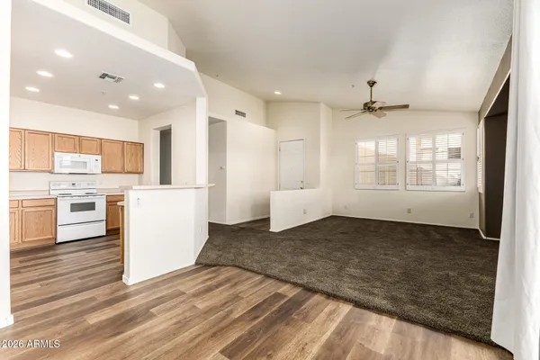 a bathroom with a sink toilet and a mirror