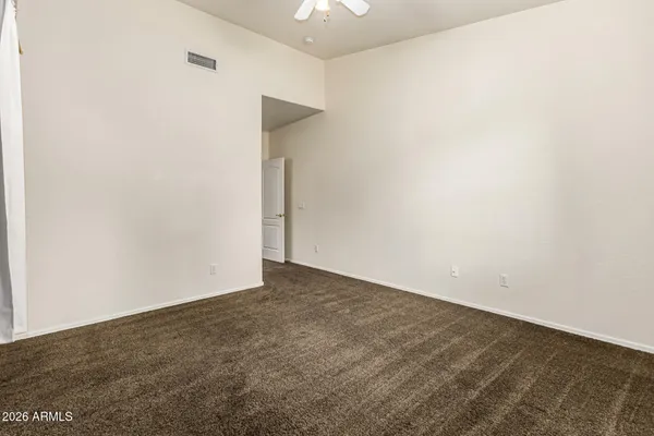 a bathroom with a double vanity sink toilet and shower