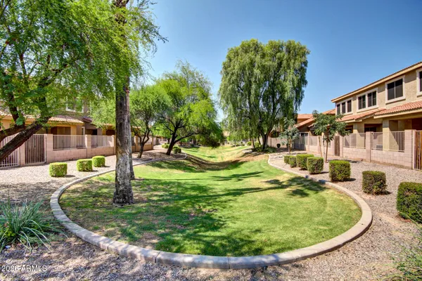 a view of a swimming pool with an outdoor space and seating area