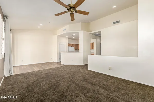 a kitchen with a stove a sink and a refrigerator