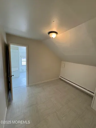 an empty room with an entryway