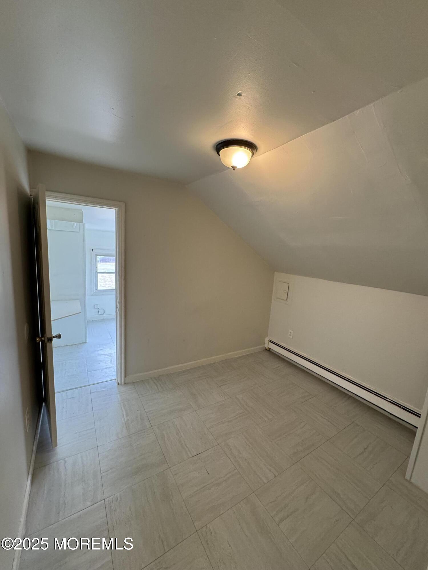 172 Carr Avenue, Unit D Keansburg, NJ 07734 - Photo 6 of 12 an empty room with an entryway