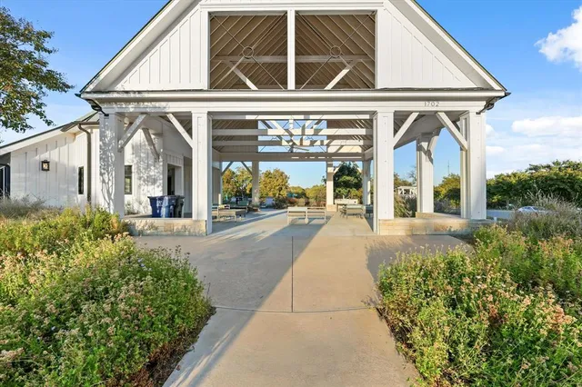 a view of a lake with outdoor seating