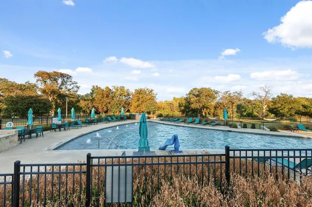 a view of a balcony with city view