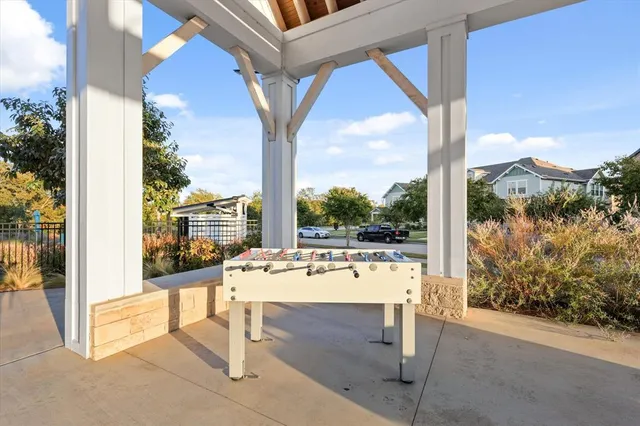 a picture of a bench in front of a window
