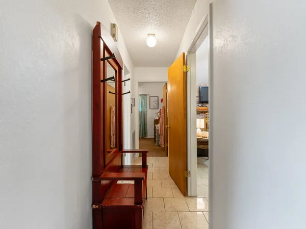 a door with a light fixture and a glass door