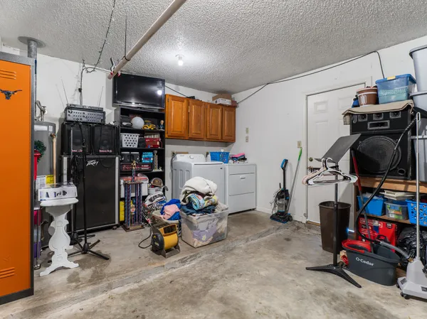 a view of storage and utility room