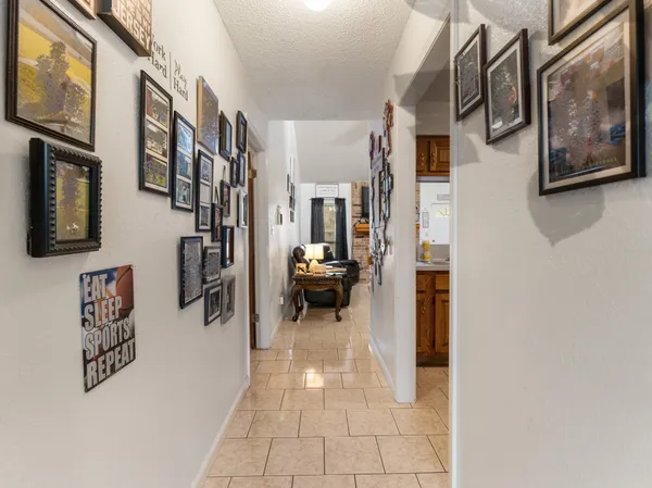 a hallway view with living room
