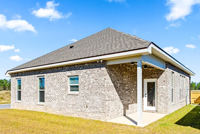 a view of a house with a swimming pool