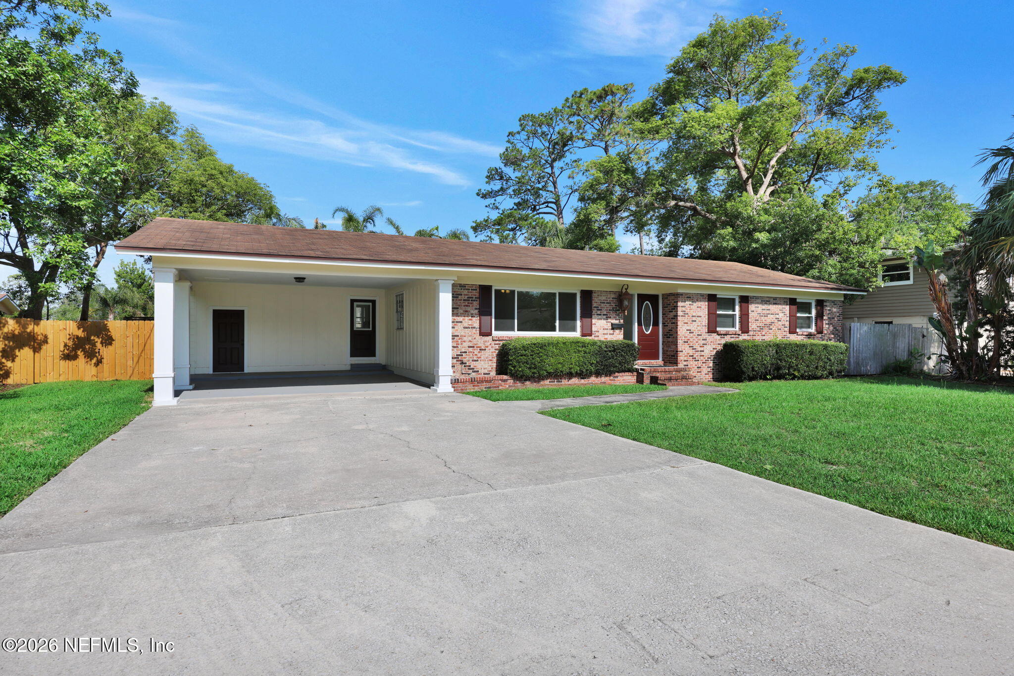 8544 Sanchez Road Jacksonville, FL 32217 - Photo 4 of 46 front view of house with a yard