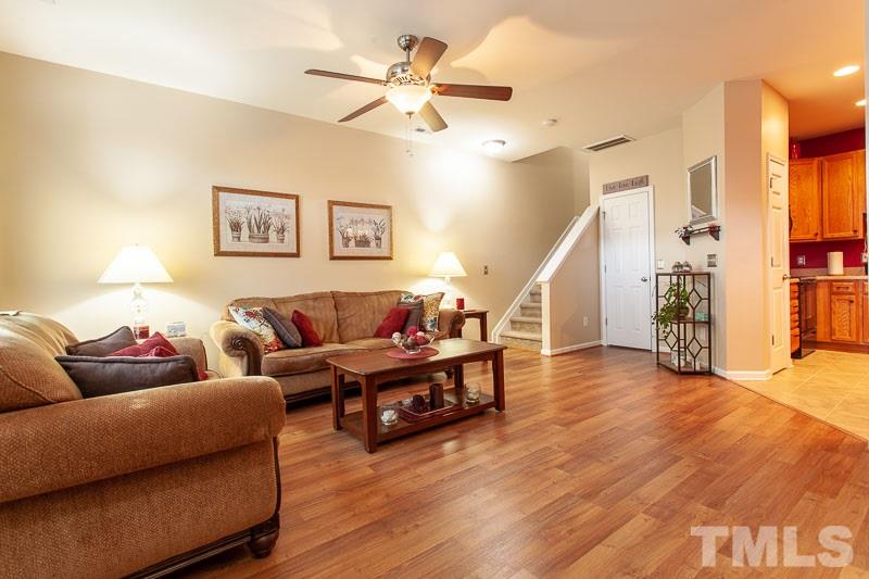 351 Gilman Lane, Unit 102 Raleigh, NC 27610 - Photo 2 of 18 Large spacious open living room, with laminate hardwoods, ready for you to enjoy entertaining company or relaxing before turning in for the night.