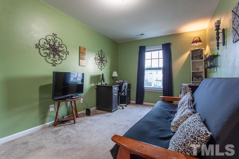351 Gilman Lane, Unit 102 Raleigh, NC 27610 - Photo 12 of 18 An office, craft room, reading room or guest room. Either way, with this space and the large walk in closet you just can't go wrong!