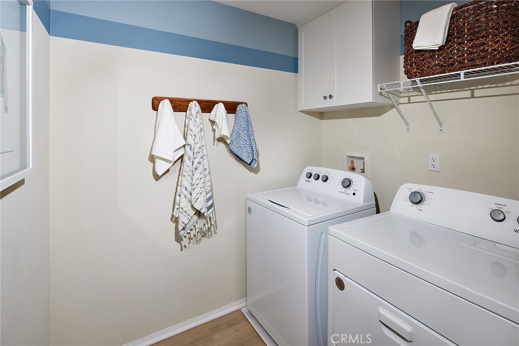 2090 El Nido Avenue Perris, CA 92571 - Photo 14 of 19 a utility room with dryer and washer
