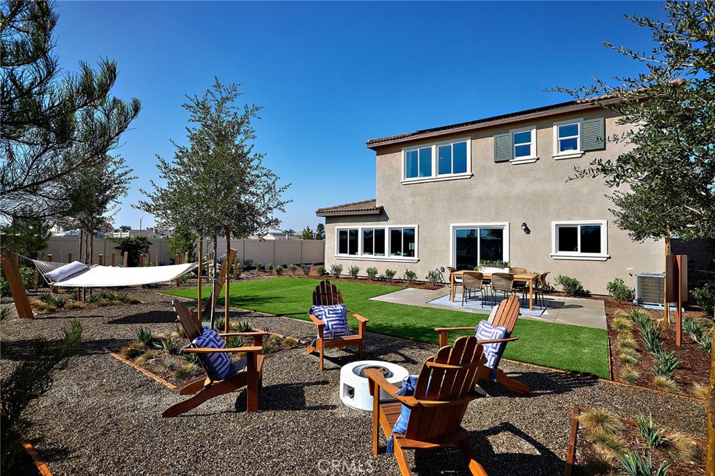 2090 El Nido Avenue Perris, CA 92571 - Photo 19 of 19 a view of a house with backyard and sitting area