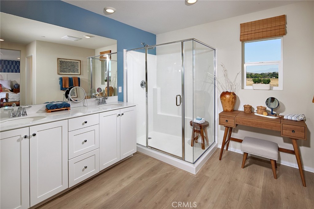 2090 El Nido Avenue Perris, CA 92571 - Photo 10 of 19 a room with white cabinets and sink