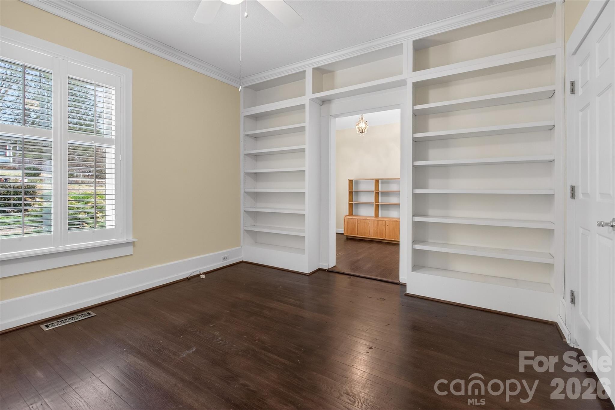 56 Whitney Avenue Tryon, NC 28782 - Photo 16 of 35 a view of walk in closet with empty racks