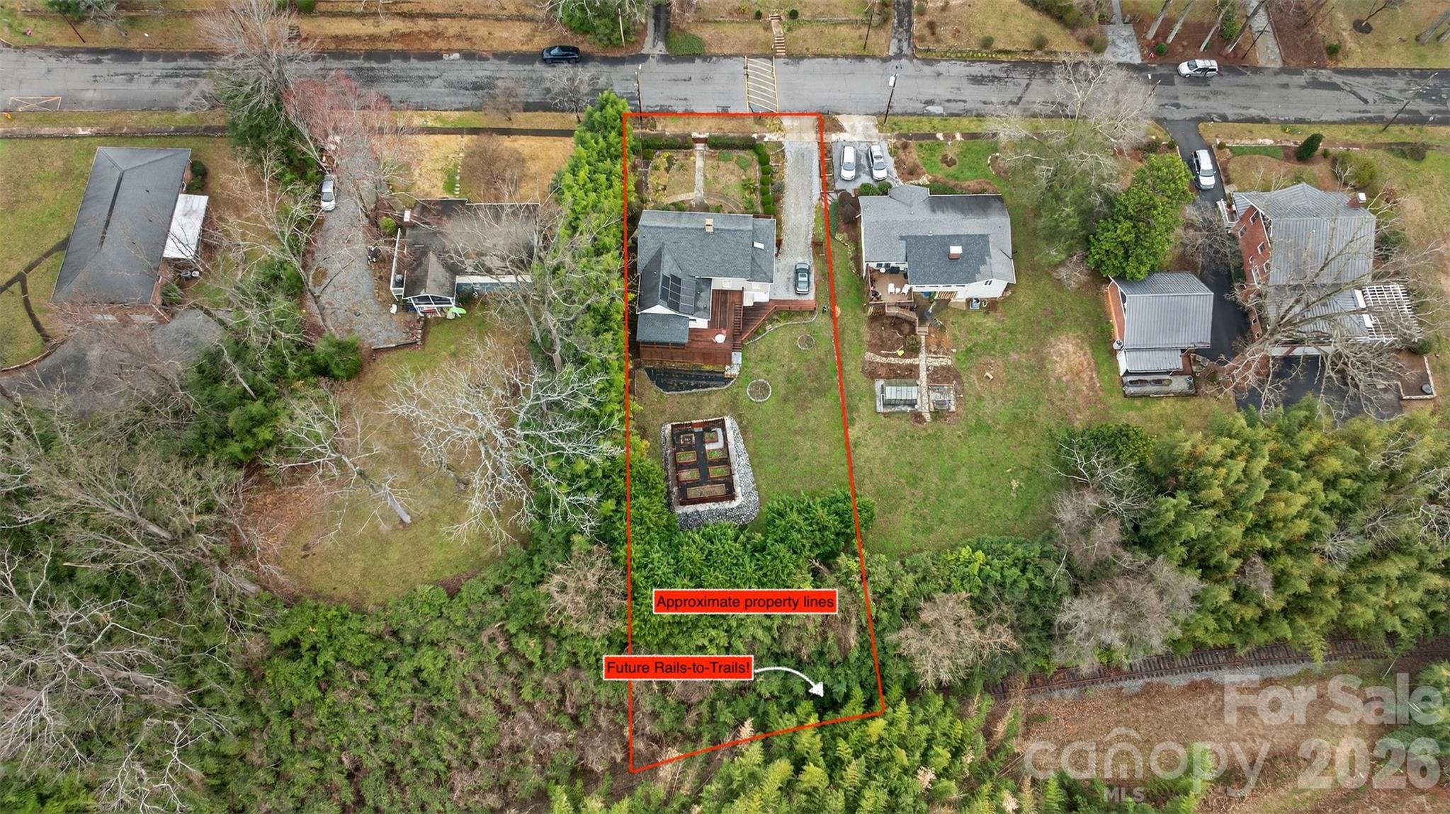 56 Whitney Avenue Tryon, NC 28782 - Photo 29 of 35 an aerial view of residential houses with outdoor space and street view