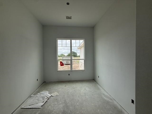 127 Riparian Elm Road Bertram, TX 78605 - Photo 13 of 25 an empty room with a window