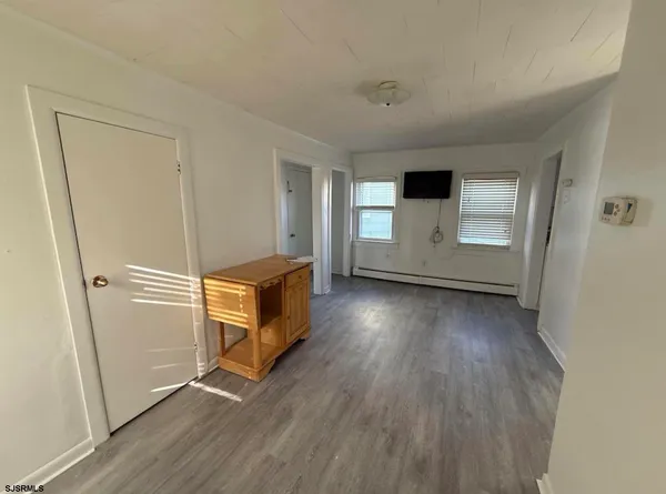 a view of an empty room and window