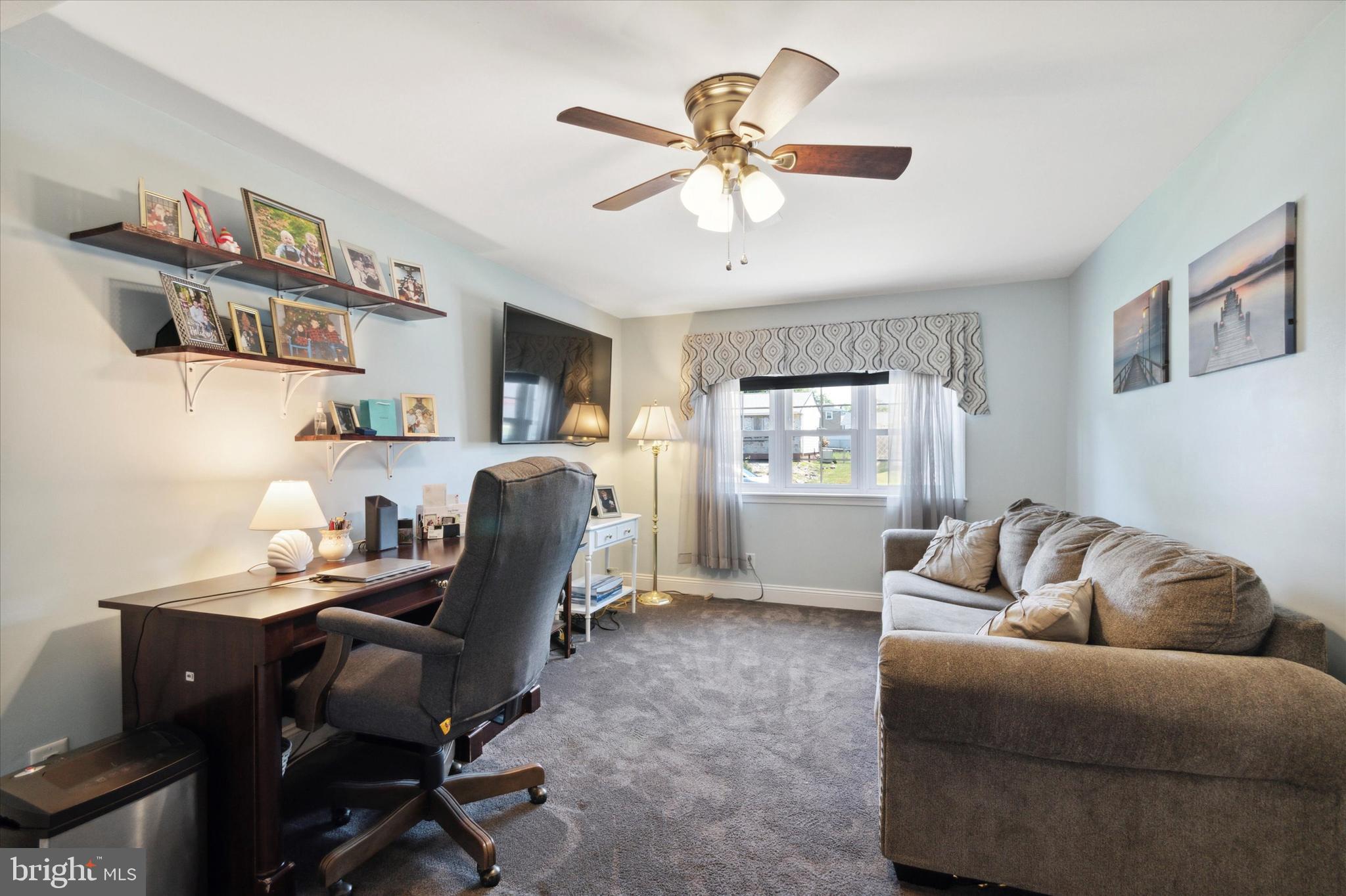 9720 Beacon Road Philadelphia, PA 19115 - Photo 4 of 35 a living room with furniture and a window