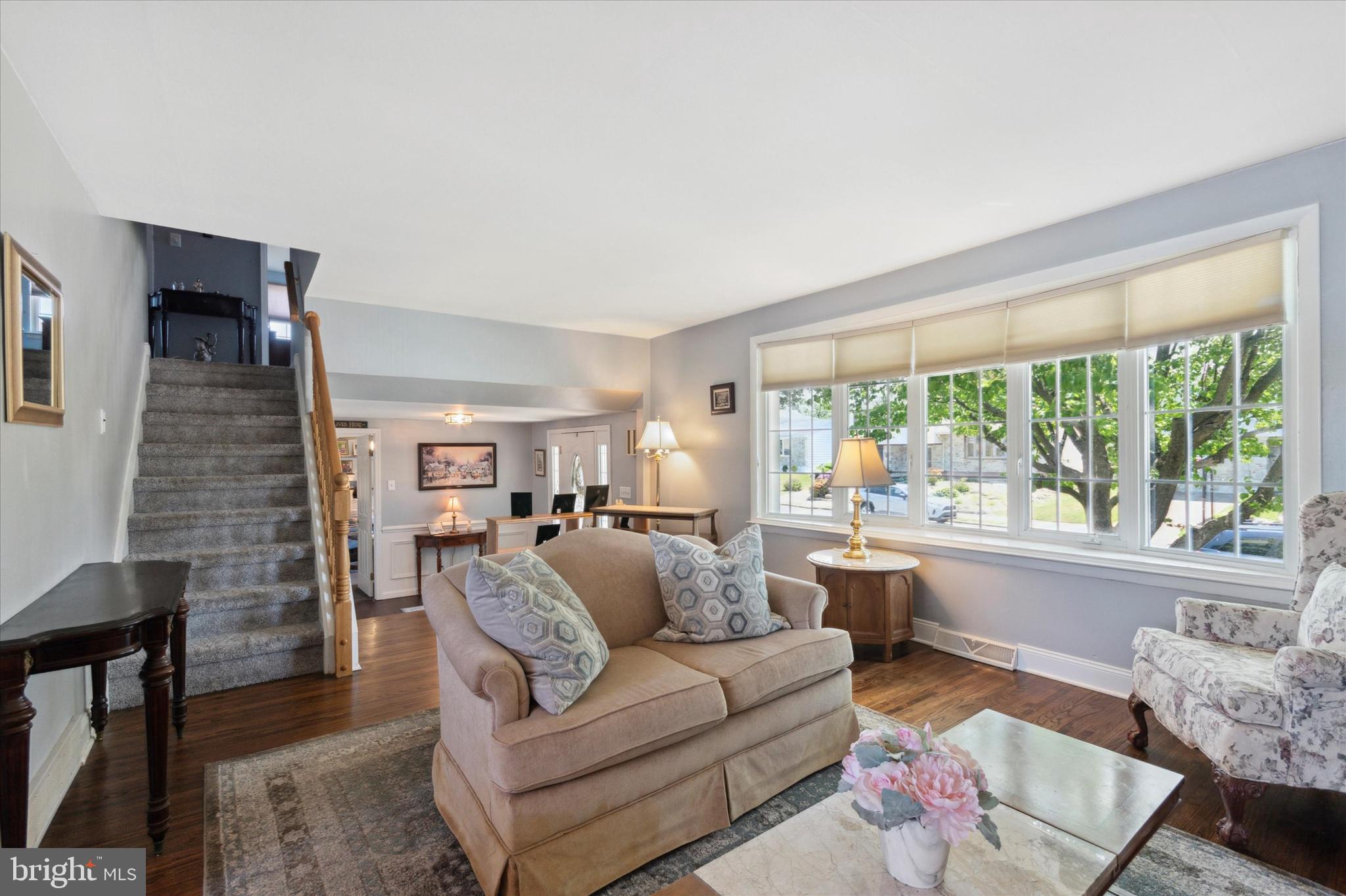 9720 Beacon Road Philadelphia, PA 19115 - Photo 5 of 35 a living room with furniture and a large window
