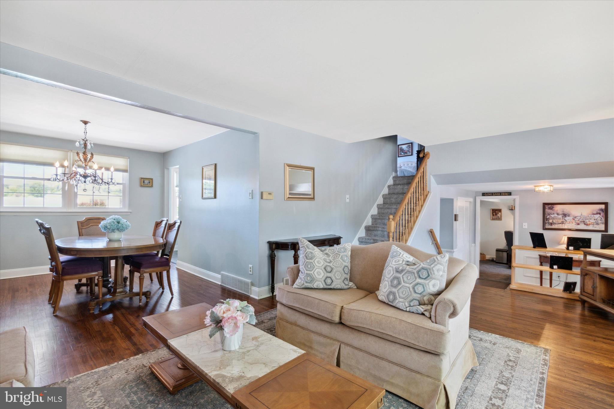 9720 Beacon Road Philadelphia, PA 19115 - Photo 8 of 35 a living room with furniture dining table and wooden floor