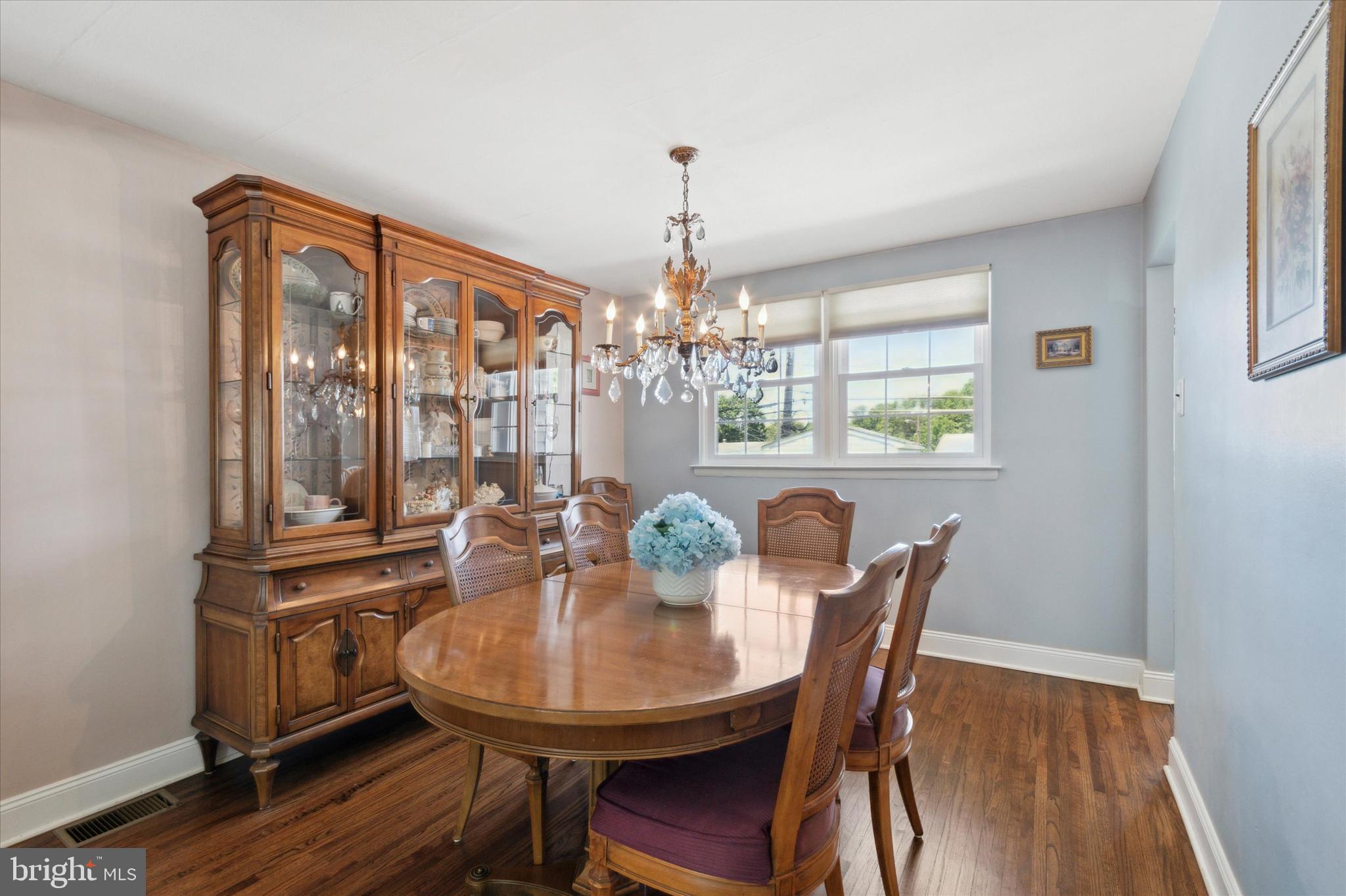9720 Beacon Road Philadelphia, PA 19115 - Photo 10 of 35 a view of a dining room with furniture window and wooden floor