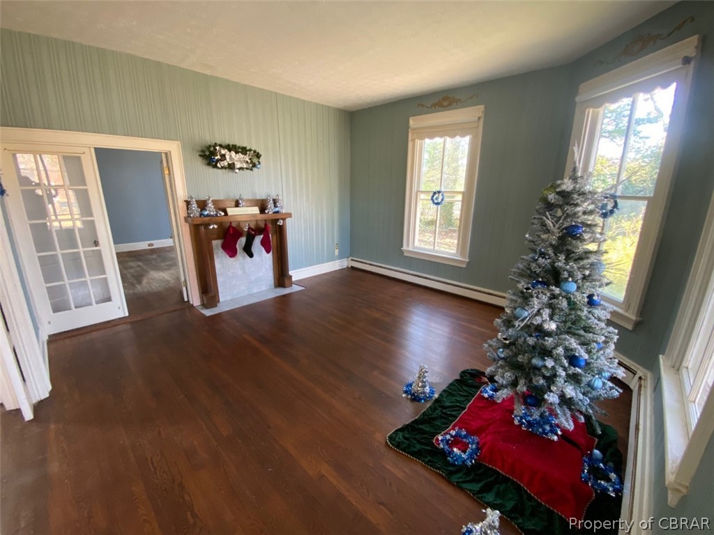 11044 Buckley Hall Road Mathews, VA 23109 - Photo 6 of 34 a view of a livingroom with furniture window and hardwood floor