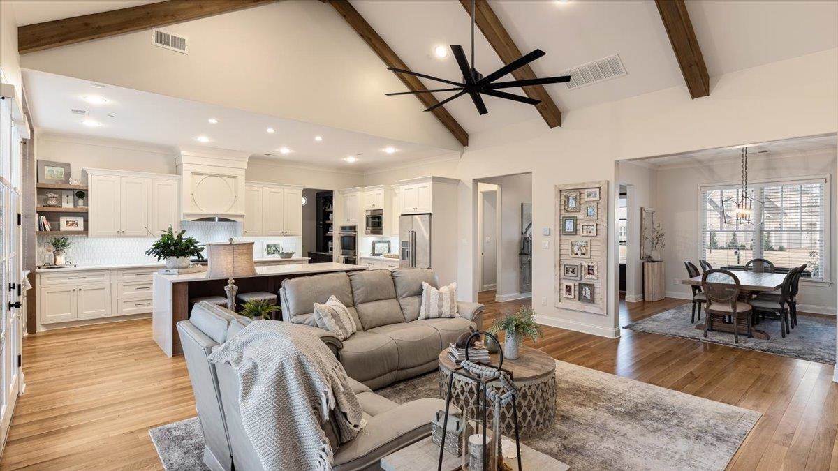 25 Jay Cove Piperton, TN 38017 - Photo 12 of 39 a living room with furniture and a wooden floor