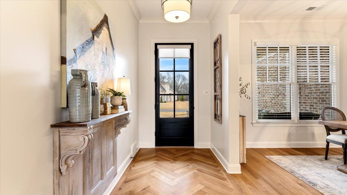 25 Jay Cove Piperton, TN 38017 - Photo 13 of 39 a view of a hallway with windows and stairs