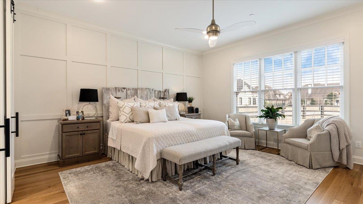 25 Jay Cove Piperton, TN 38017 - Photo 16 of 39 a bedroom with a bed and ceiling fan