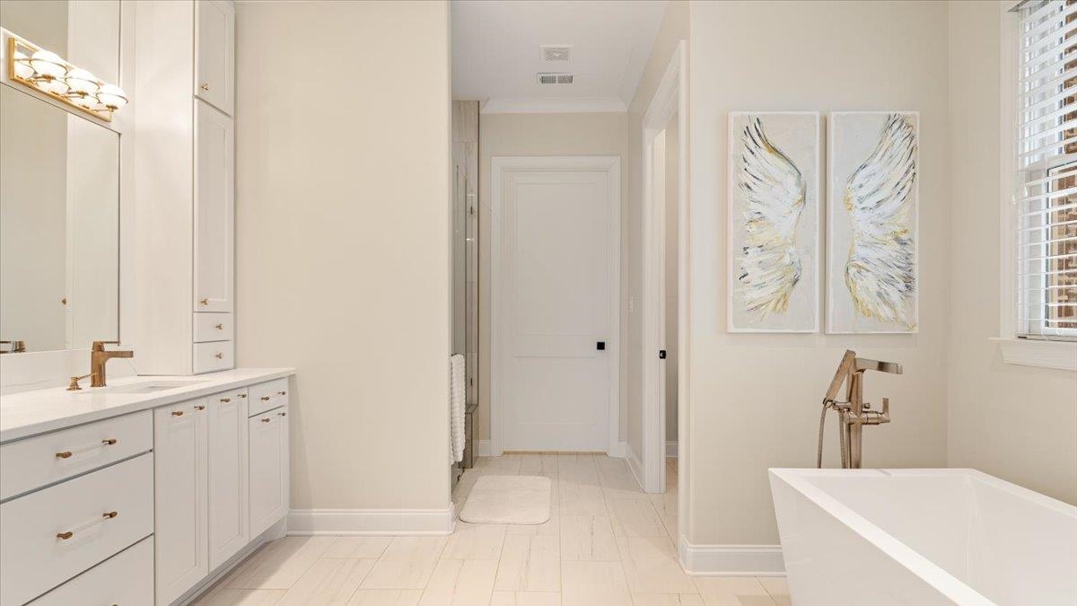 25 Jay Cove Piperton, TN 38017 - Photo 18 of 39 a spacious bathroom with a tub sink and mirror