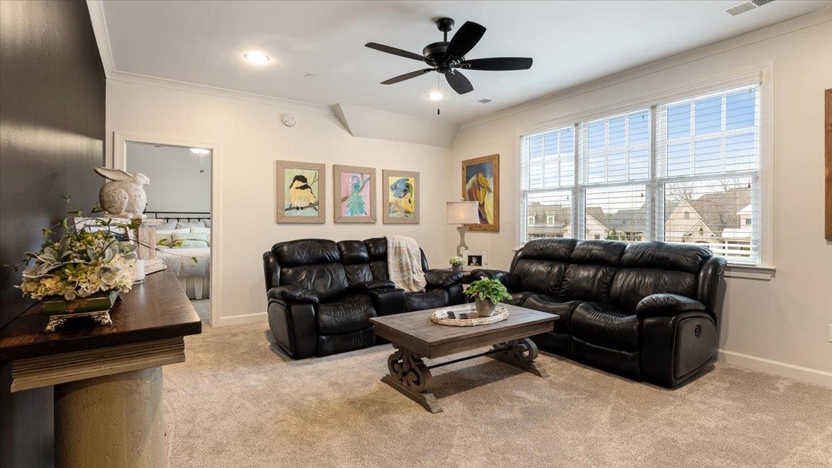 25 Jay Cove Piperton, TN 38017 - Photo 28 of 39 a living room with furniture and a large window