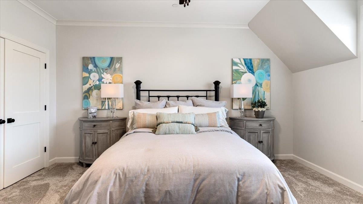 25 Jay Cove Piperton, TN 38017 - Photo 30 of 39 a bedroom with a bed and window