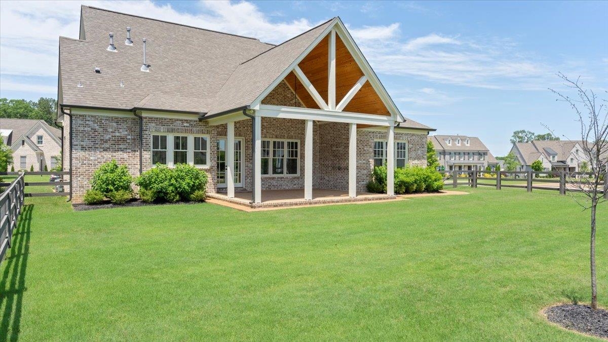 25 Jay Cove Piperton, TN 38017 - Photo 36 of 39 a front view of a house with garden