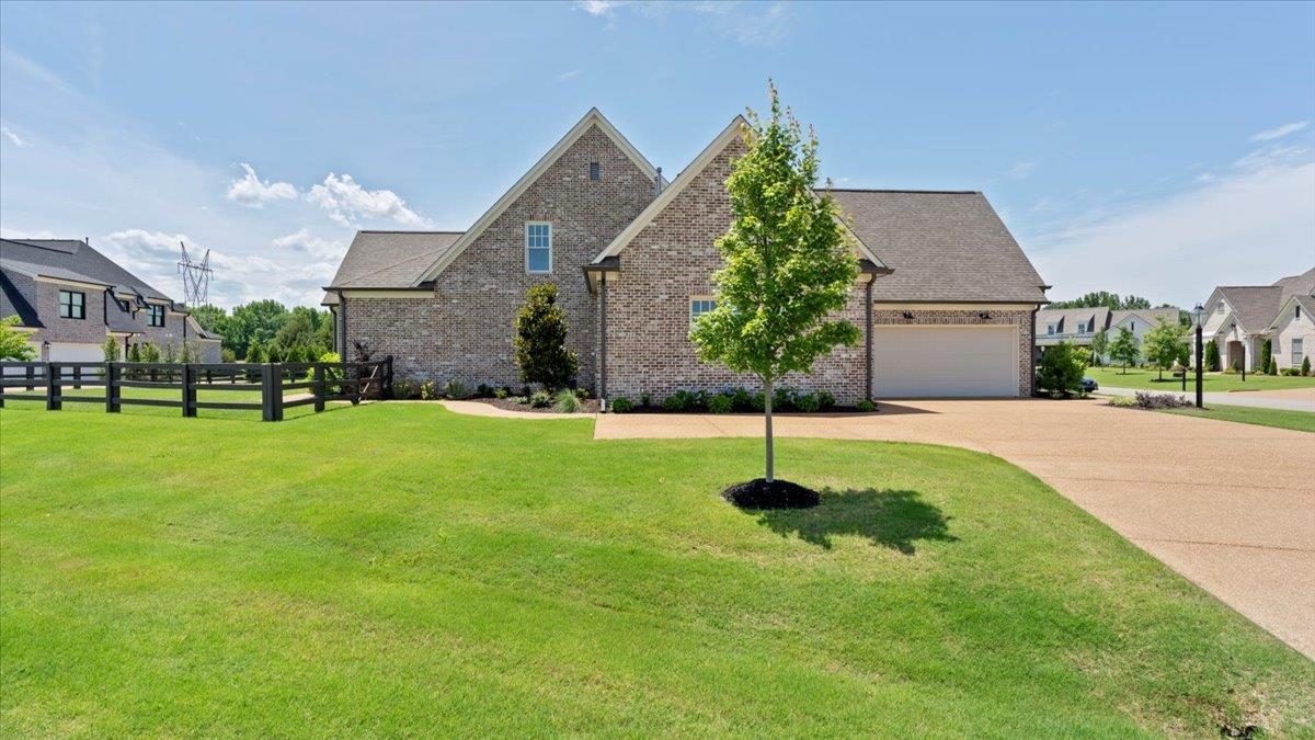 25 Jay Cove Piperton, TN 38017 - Photo 37 of 39 a front view of a house with a yard