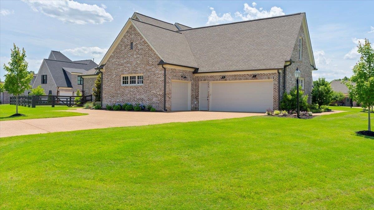 25 Jay Cove Piperton, TN 38017 - Photo 38 of 39 a front view of house with yard and green space