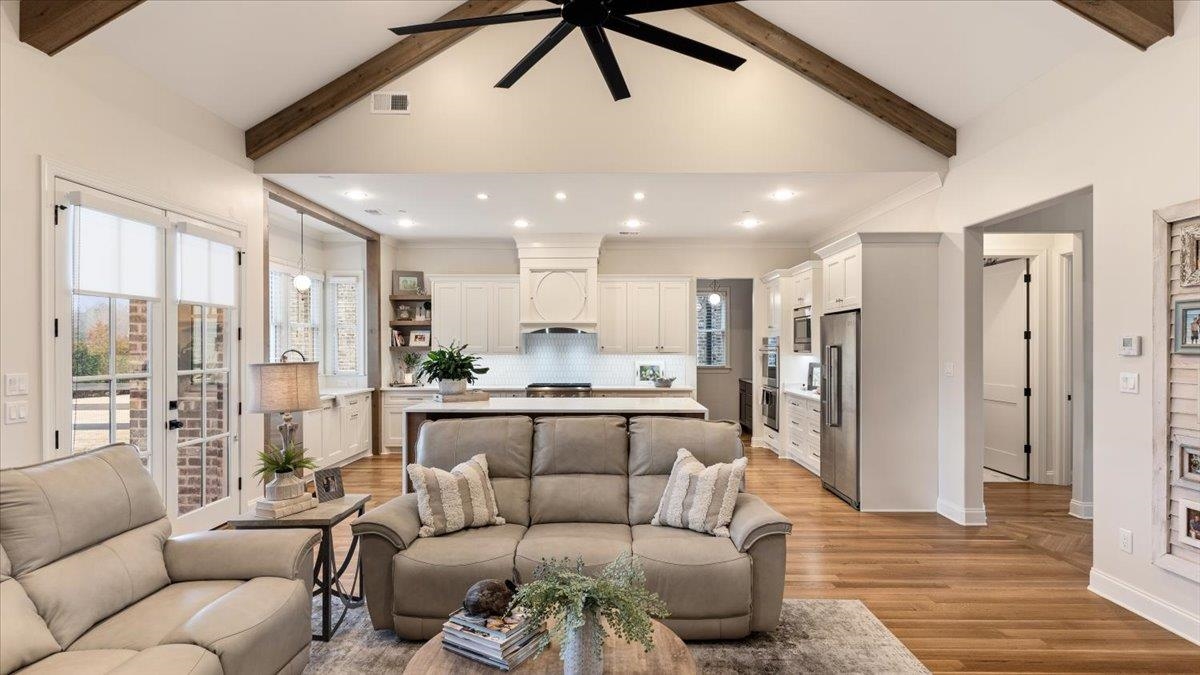 25 Jay Cove Piperton, TN 38017 - Photo 10 of 39 a living room with furniture wooden floor and a large window