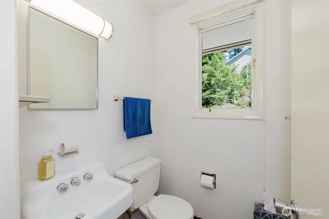 a room with kitchen island a large window in it